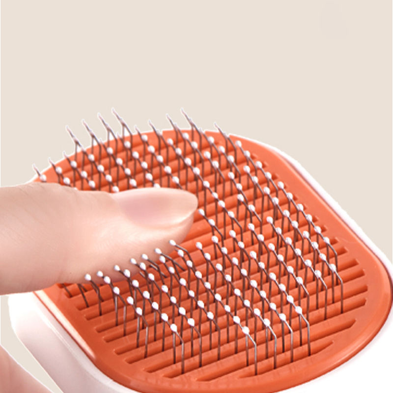 Brosse de Toilettage Anti-Poils pour Chien & Chat – Peigne Auto-Nettoyant, Confort et Brillance | Panier, lit et accessoires design pour animaux - CoconDou
